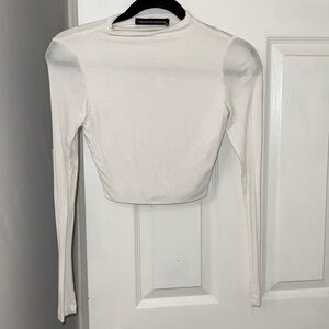 white crop top from Naked Wardbrobe